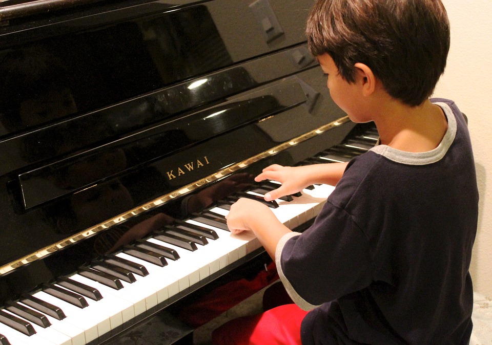 child playing piano in McLean